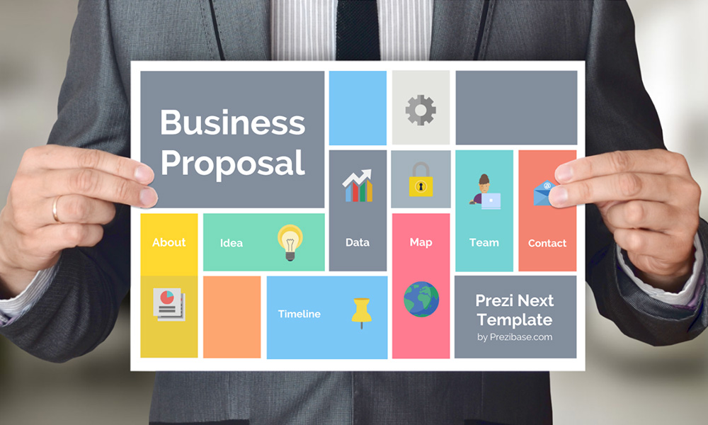 Businessman holding business proposal plan presentation template for prezi