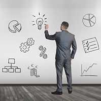 businessman-in-suit-writing-businessplan-to-wall-sketch